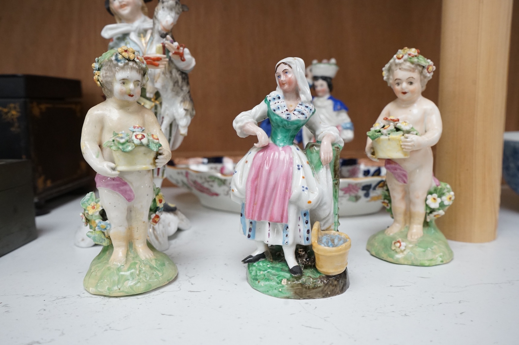 Four 19th century Continental porcelain figures and two Derby style figures, largest 19cm high